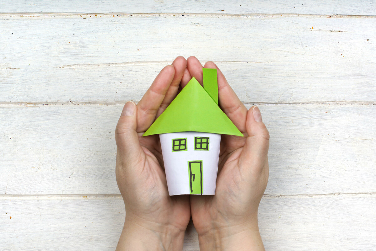 Haus in der Hand